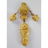 An 18th century ormolu chatelaine, cast with classical figures and scrolls, the main central body