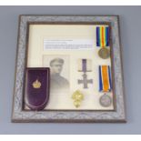 A WWI MC group to 2nd Lieut John Fraser, Royal Fusiliers, the MC framed and mounted with a