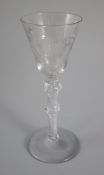 A air twist wine glass, of Jacobite significance, c.1745, the rounded funnel shaped bowl engraved