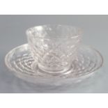 An unusual George II glass tea bowl and saucer, second quarter 18th century each honeycomb