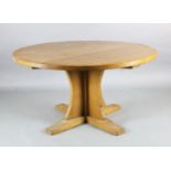 Robert Thompson "Mouseman". An adzed oak centre table, with circular top and saltire underframe