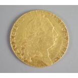 A George III gold guinea, 1794, fifth laureate head, 'spade shield'