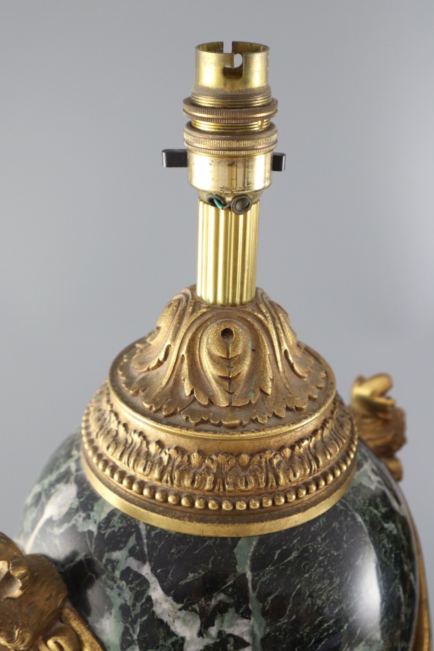 A pair of early 20th century ormolu green marble table lamps, with ovular form with mask lug handles - Image 3 of 6