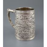 A 19th century Chinese Export silver mug, by Khecheong?, embossed with continuous scene of figures