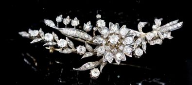 A Victorian gold, silver, old mine and rose cut diamond set foliate spray brooch, 9cm, gross 23.4