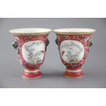 A rare pair of Chinese yangcai 'New Year Longevity' stem cups, Qianlong or Jiaqing period, each of