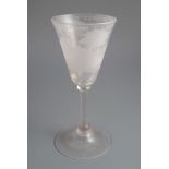 A Dutch wheel engraved wine glass, c.1750, the bucket shaped bowl inscribed 'D. KIELE EN WIELE EN.