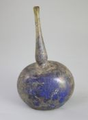 An Islamic blue glass perfume sprinkler, Egypt, c.1250-1350 AD, mould blown with pronounced kick and