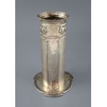 An Edwardian Art Nouveau Liberty Cymric silver cylindrical vase, Birmingham 1904, on stylised shaped