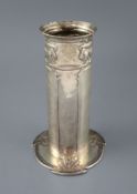 An Edwardian Art Nouveau Liberty Cymric silver cylindrical vase, Birmingham 1904, on stylised shaped