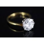 A modern 18ct gold and solitaire brilliant cut diamond ring, size O, gross 3.9 grams, the stone