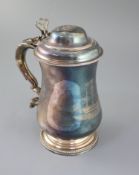 A George III silver tankard, by Thomas Chawner, of baluster form, the domed cover with pierced