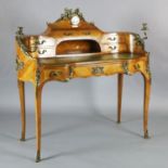 A Louis XV style kingwood and ormolu mounted bureau à rognon, the raised back inset with an eight