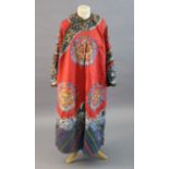 A Chinese red satin 'dragon' winter robe, late Qing dynasty, with padded lining, finely