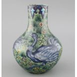 A rare William de Morgan 'Ostrich' bottle vase, c.1888-97, painted by Joe Juster, with a repeating