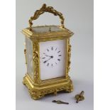 Jules of Paris. A 19th century French ormolu hour repeating carriage clock, in cast case with