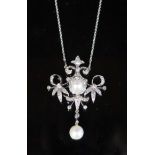 A late Victorian gold, silver, round and rose cut diamond, split pearl and drop pearl set pendant