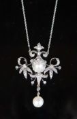 A late Victorian gold, silver, round and rose cut diamond, split pearl and drop pearl set pendant