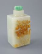 A Chinese pale celadon and russet jade rectangular snuff bottle, 19th century, the carver skillfully