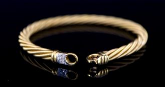 A Wellendorf 18ct. gold cable twist link bracelet with diamond set clasp, approx. 18.5cm, gross