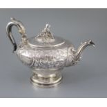 A George IV? silver pedestal teapot with thistle finial, marks rubbed, of inverted pear form and