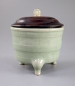 A Chinese Guan type tripod censer, the wood cover with hardstone finial, 8.2cm diameterCONDITION: