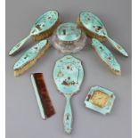 A 1920's silver and gilded chinoiserie guilloche enamel eight piece dressing table set, by Adie