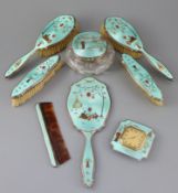 A 1920's silver and gilded chinoiserie guilloche enamel eight piece dressing table set, by Adie