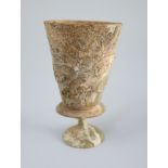 An Islamic colourless glass goblet, Iran, 12th century, the bucket shaped bowl with applied scrolled