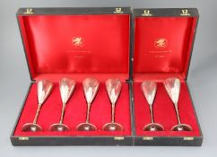 A set of six modern Stewart Devlin parcel gilt silver goblets (Senior Falcon Award 1979 & 1980) in