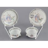 A pair of Chinese famille rose 'sages tea bowls and saucers, Qianlong period, each painted with