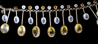 A Victorian 9ct gold, citrine and aquamarine? set riviere necklace, set with oval and round cut