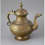 An 18th century Mughal Indian bronze and parcel gilt ewer, decorated with bands of scrolling