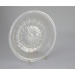 A crizzled lead glass dish, c.1680, of Ravenscroft type, with folded rim, petal moulded base and