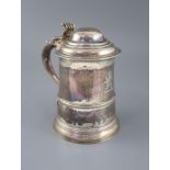 A George III silver tankard by Francis Crump, with engraved crest, domed lid and scroll