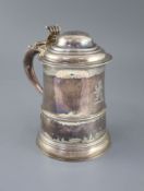 A George III silver tankard by Francis Crump, with engraved crest, domed lid and scroll
