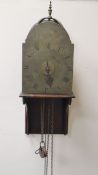 Nathaniel Cavell of Ipswich. A late 18th century brass lantern clock, with arched foliate engraved