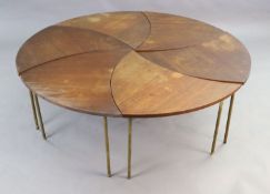 Peter Huidt and Orla Malgaard-Neilson for France & Son. A Danish teak and brass 'pinwheel' modular