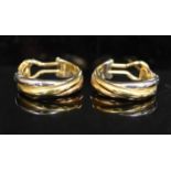 A pair of modern Cartier 18ct three colour gold hoop earrings, signed and numbered 775302, in