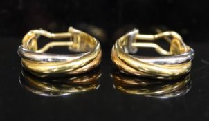 A pair of modern Cartier 18ct three colour gold hoop earrings, signed and numbered 775302, in