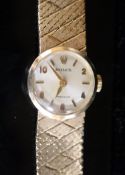 A lady's 1960's 9ct gold Rolex Precision manual wind wrist watch, with baton & Arabic numerals, on