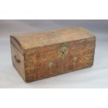 A 17th century Russian leather travelling trunk, the domed top with brass studded decoration forming