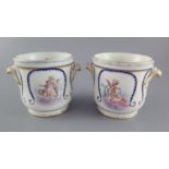 A pair of Sevres half bottle wine coolers, probably 18th century Sevres with 19th century