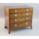 A George III mahogany dressing chest, fitted four graduated long drawers, the top drawer with