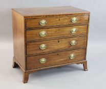 A George III mahogany dressing chest, fitted four graduated long drawers, the top drawer with