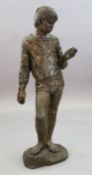 § Karin Jonzen (1914-1998). A bronze figure of a standing boy holding an ammonite shell, signed in