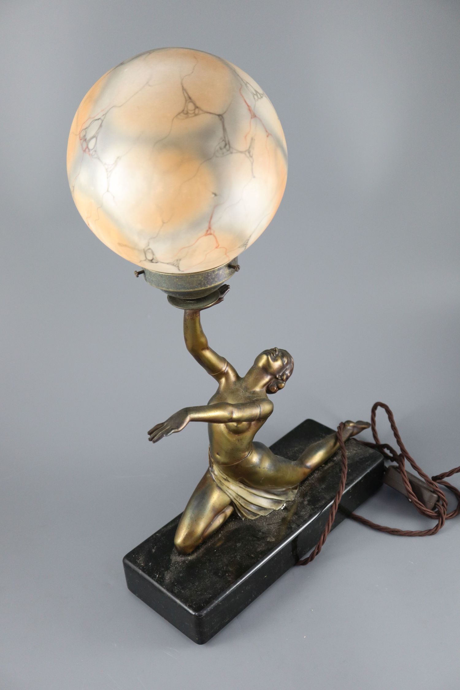A French Art Deco bronzed spelter table lamp, modelled as a kneeling dancer holding aloft a - Image 3 of 3