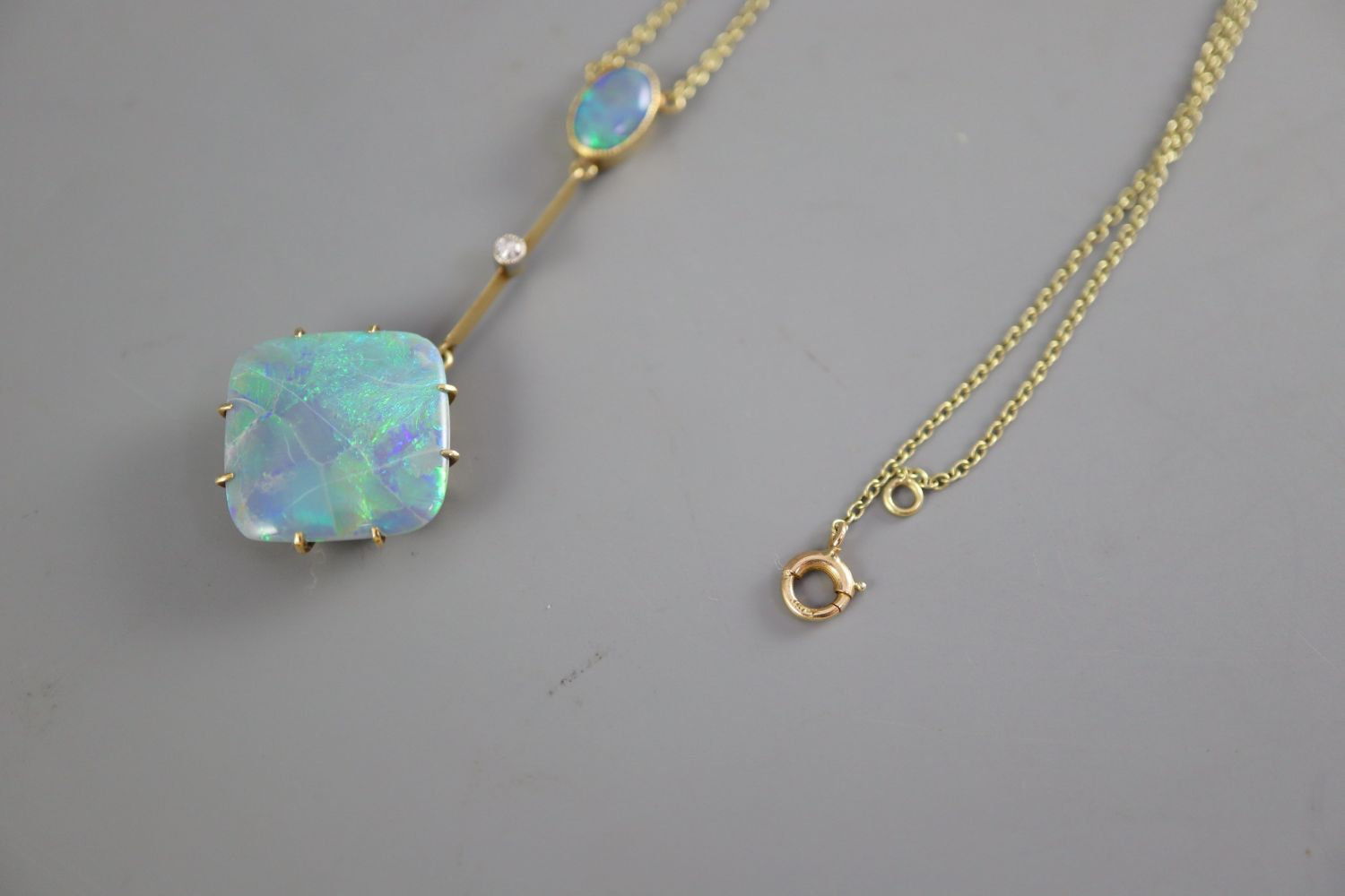 An early 20th century 15ct gold, diamond and two stone opal set drop pendant necklace, pendant 50mm, - Image 3 of 5