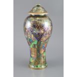 A Wedgwood Fairyland lustre Jewelled Tree pattern 2046 shape vase and cover, designed by Daisy