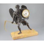 A 19th century French bronze mantel clock, modelled as Cronos holding an ormolu scythe, the drum